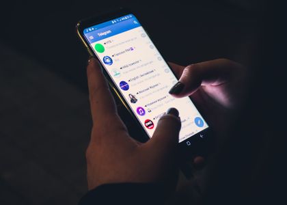 how to report someone on telegram